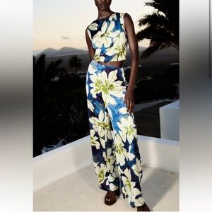 Zara women floral print cut out blue white jumpsuit size medium